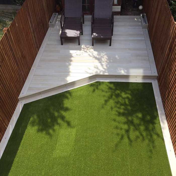 Millboard - Smoked Oak with easigrass and Fencing - East London